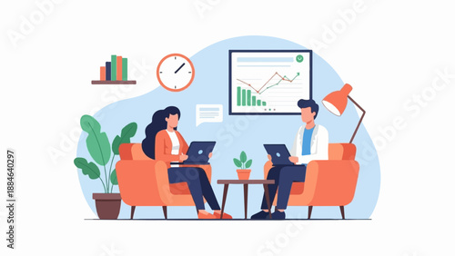 Two colleagues collaborate on laptops in a modern office setting