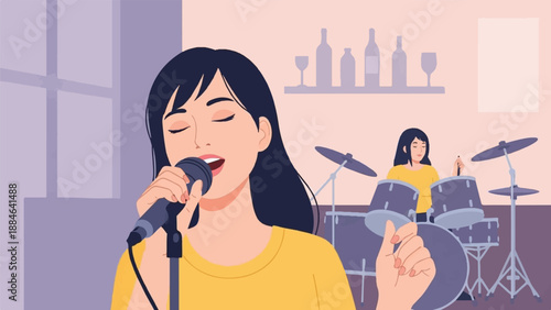 Women performing music, one singing into microphone, other drumming