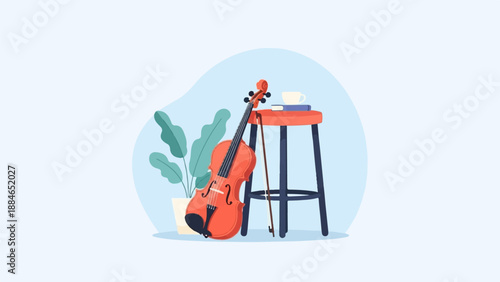 A violin rests near a stool with books and a cup, next to a potted plant