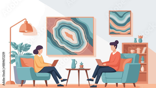 Two women work on laptops in cozy chairs in a well-decorated room