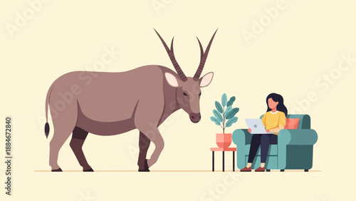 Woman in armchair on laptop, large antelope walks past