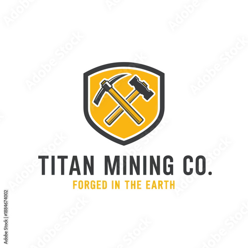 Titan Mining Co Logo with Pickaxe and Hammer.