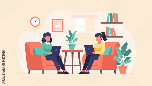 Two women using laptops while sitting on couches in a cozy room