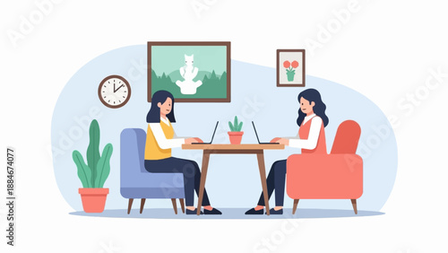 Two women work on laptops at a table in a room