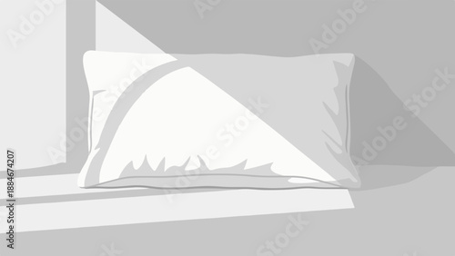 White pillow on windowsill with soft light and shadow