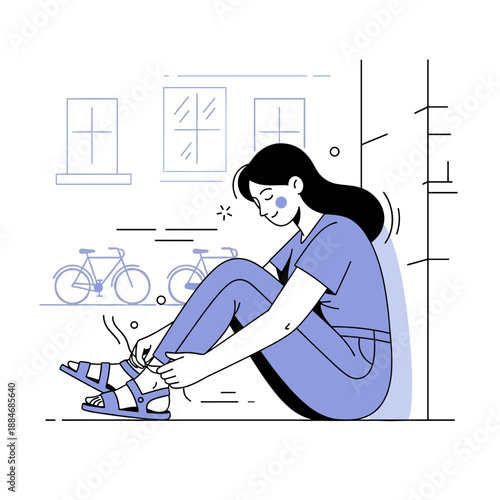 Young asian female adjusting sandals while sitting outdoors near bicycles
