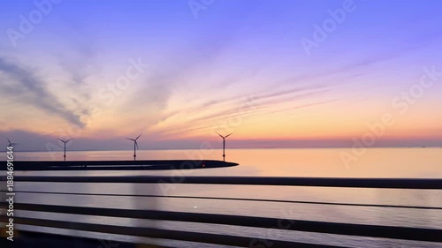 Great Belt Bridge sunset drive with wind turbines, Denmark