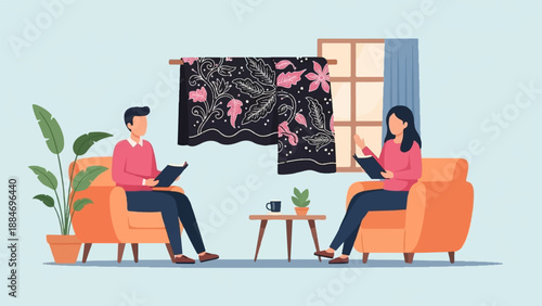 Couple relaxes in armchairs reading books beside a window