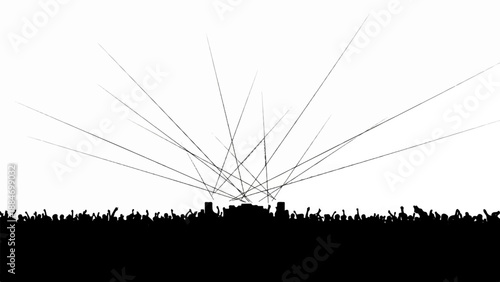 Crowd with hands raised under energetic beams of light