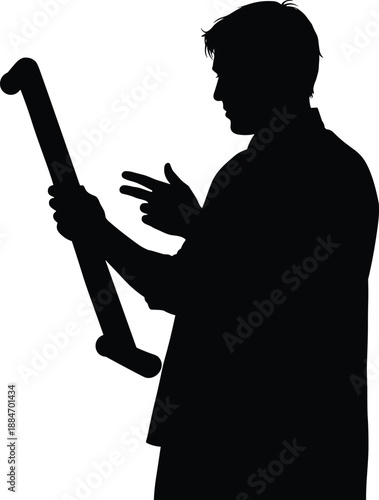 Silhouette of a person holding a baseball bat in a ready stance