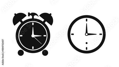 Two black and white clocks displaying different times side by side