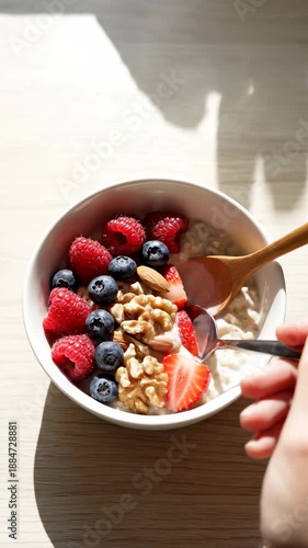 Healthy Breakfast Oatmeal Bowl With Fresh Berries And Nuts