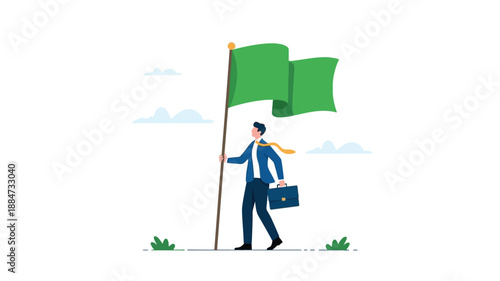 Businessman holding a green flag, symbolizing success and achievement in business