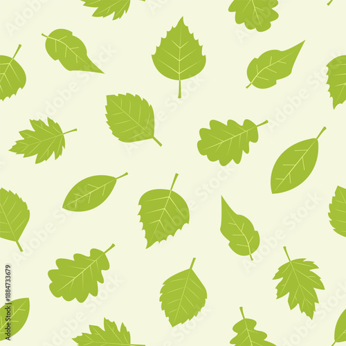 Green leaves scattered on a light background in a simple design for nature-themed projects or crafts. Seamless pattern