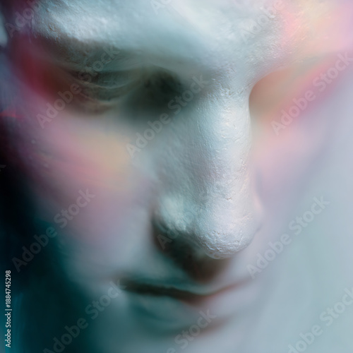 Abstract soft-focus face with pastel glow and dreamy lighting in ethereal digital art
