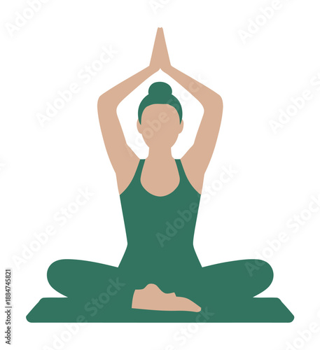 A woman in green clothing sitting in a yoga pose with her hands raised above her head