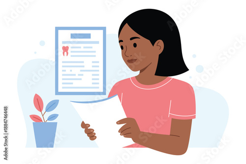 A young woman reviews dental information and holds a tooth model in her hand.