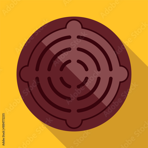 Round brown manhole cover with a long shadow on an orange background, perfect for infrastructure concepts