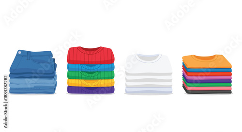 Four neatly organized stacks of freshly folded clothing, including jeans, colorful sweaters, and white and multi-colored t-shirts, representing laundry, organization, and wardrobe essentials.