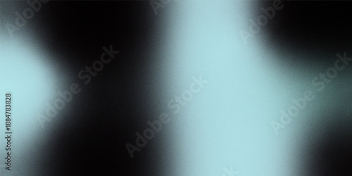 An abstract image showcasing a blurred soft blue gradient with a predominantly dark and mysterious aesthetic