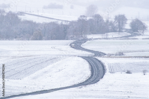winding road in snowy weather