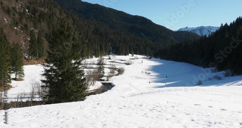 Spitzingsee-Tegernsee ski area in Bavarian Alps. Cross-country ski trail along  Rote Valepp river and snowy Valepper Almen at the foot of the Schwarzenkopf.

