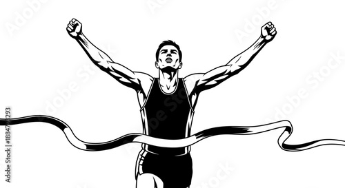 Man crossing finish line with arms raised in victory