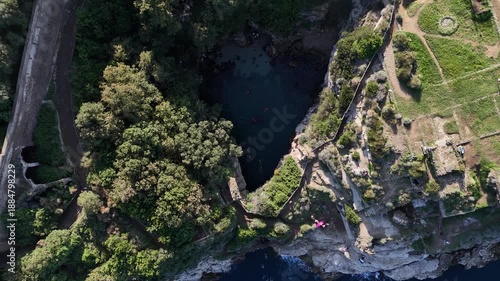 Aerial Drone Footage of Bagni della Regina Giovanna Ancient Roman Ruins and Natural Pool