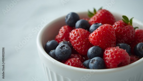 Bowl of Fresh Strawberries and Blueberries on a Light Background for Healthy ...