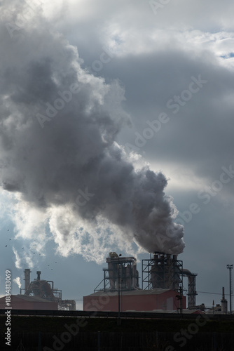 smoke coming out of factory chimney pollution concept