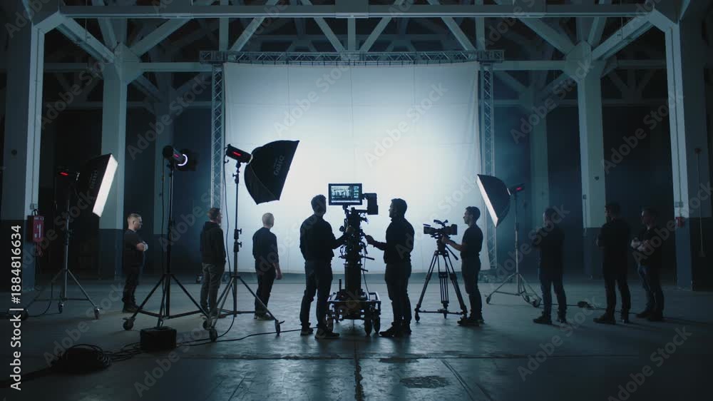 custom made wallpaper toronto digitalProfessional film crew with cameras and lighting equipment working on a movie set. Backstage of a video production in a large industrial studio with a white screen background