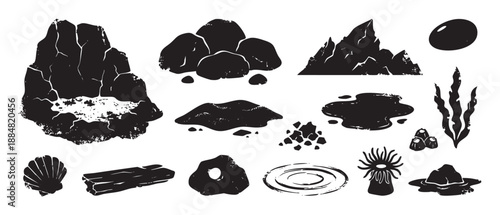 Black silhouette icons of coastal nature elements like stones, seaweed, a seashell, and driftwood, depicted in a distressed, grunge stamp print vector illustration collection