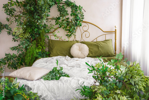 Obraz na plátně Cozy bedroom adorned with lush greenery and natural spring decor for tranquil atmosphere