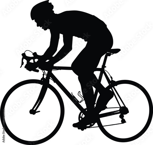 Silhouette of a cyclist riding a bicycle