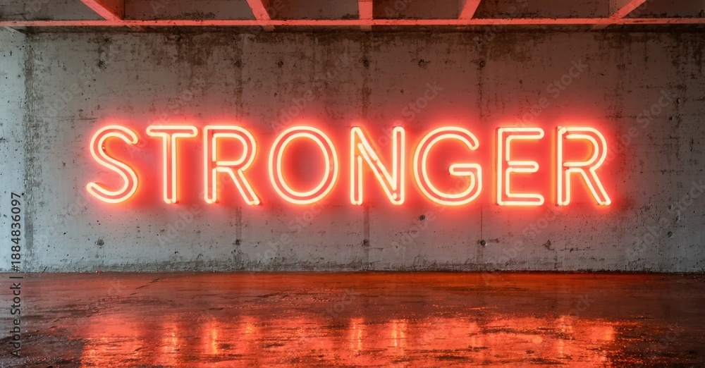 Fototapeta premium Concrete tunnel displays bright neon sign reading STRONGER. Reflections illuminate polished floor. Minimalist composition, dramatic lighting.