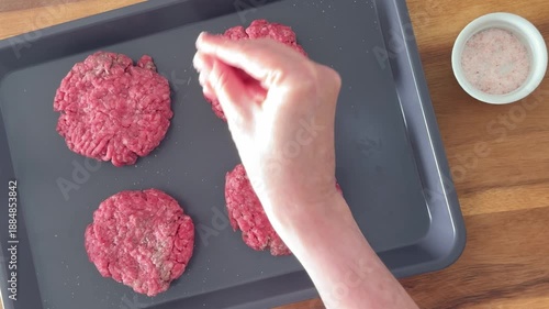 Seasoning Beef Hamburger Shot From Above