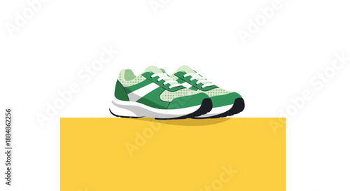 A pair of green and white running shoes with white laces, placed on a yellow surface.