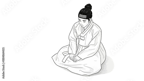 Woman in traditional dress sitting on floor.