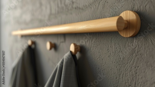 A photo of a simple wooden coat rack with no decorations.
