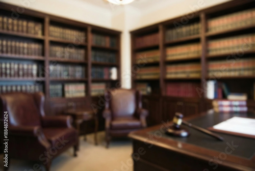 Blurred a judge's gavel on a desk in a law library