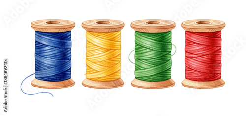 Four vibrant colorful spools of sewing thread with wooden cores in a neat row