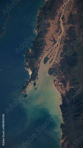 Vertical fly over of Tavoy River estuary in Myanmar, slow water movement animation based on Nasa imagery