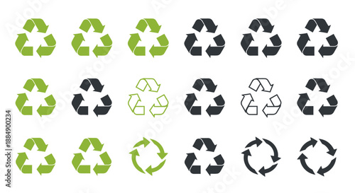 Set of various styles of recycling symbols in green and black colors.