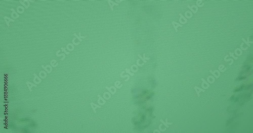 Faint puff trail forming top-left shifting rightward, growing, blurring, showing moire on clear bg