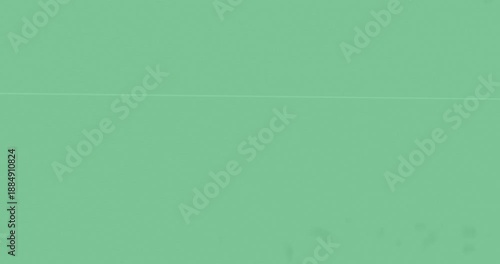 Diagonal smoke streak drifting on transparent, panel entering center causing blackout, grain rising