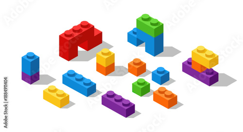 Colorful Building Blocks Scattered on White Background.