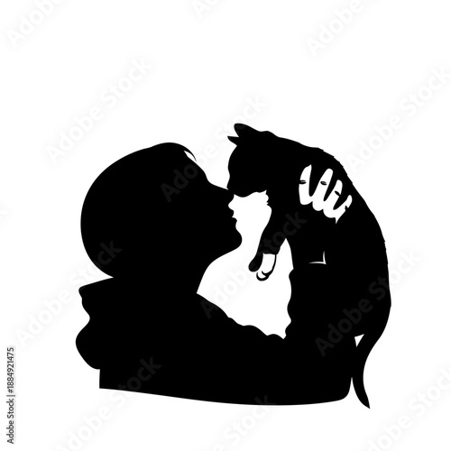 Tender moment between a girl and her cat in silhouette.