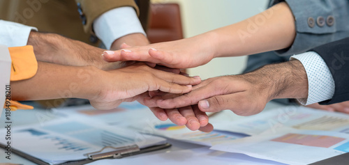 Photos join hand diverse group teamwork meeting businessman join hands trust contract in office