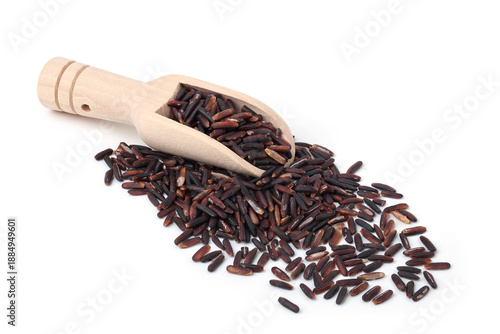 Riceberry was in a wooden spoon and spilled on the floor. isolated on white background.