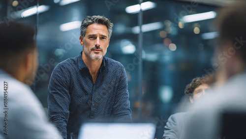 Male COO leading operational workflow meeting